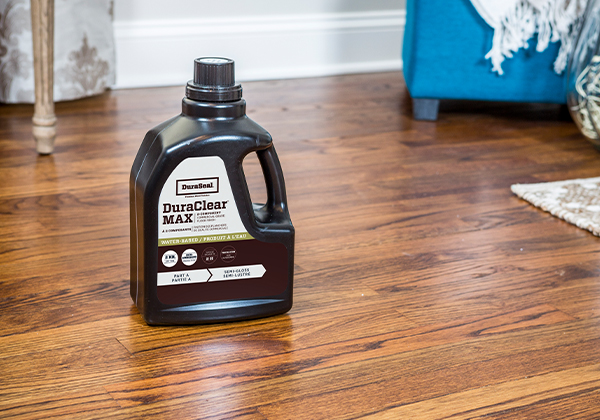 Image of DuraSeal Dura Clear MAX container on a freshly stained wood floor.