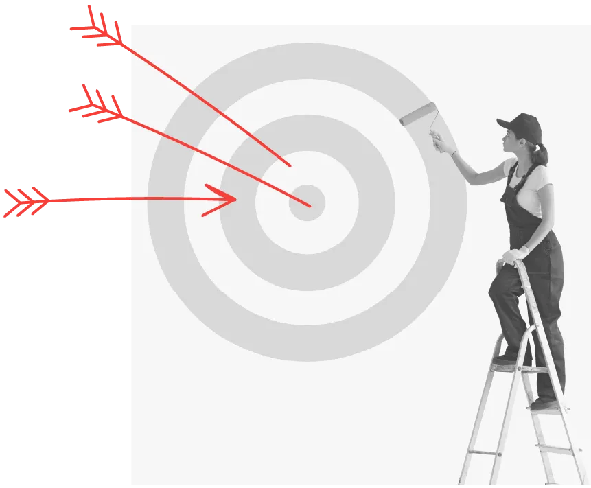 arrows hitting a target being painted by a woman